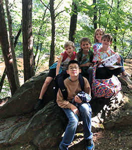 Students outside in the woods